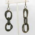 Pair of metallic chain-link earrings on a white background