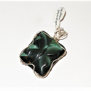rainbow obsidian stone butterfly pendant with silver setting on a white background