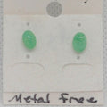 Green oval earrings on a metal-free earring card.