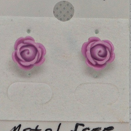 Purple rose-shaped earrings on a white card with text.