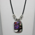 Necklace with a colorful pendant on a white background