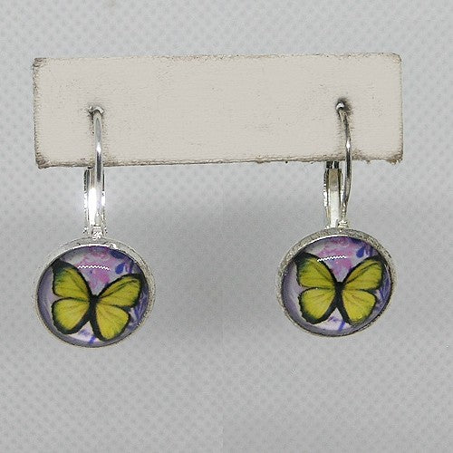 Butterfly-themed earrings on a white card with a gray background