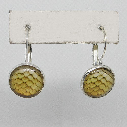 Round earrings with a textured yellow design on a white background