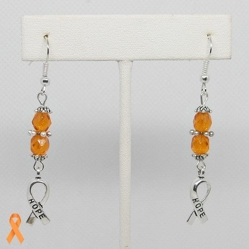 Earrings with orange beads and 'HOPE' charms on a white background