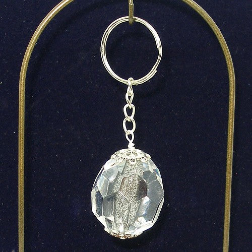Crystal keyring on a dark background