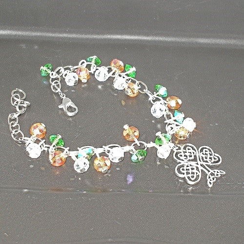 Multicolored beaded bracelet with a clasp on a dark surface